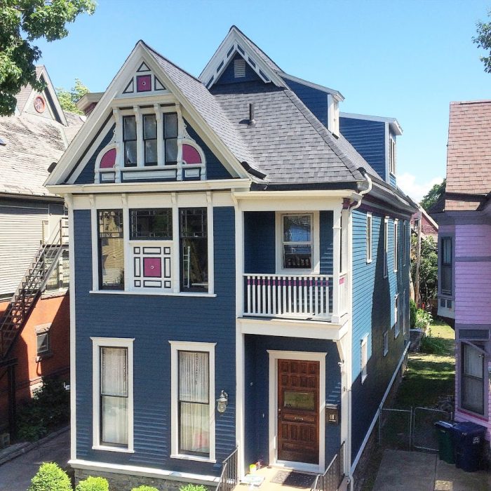 Blue-Multi-Story-Charming-Home-With-White-And-Pink Trim