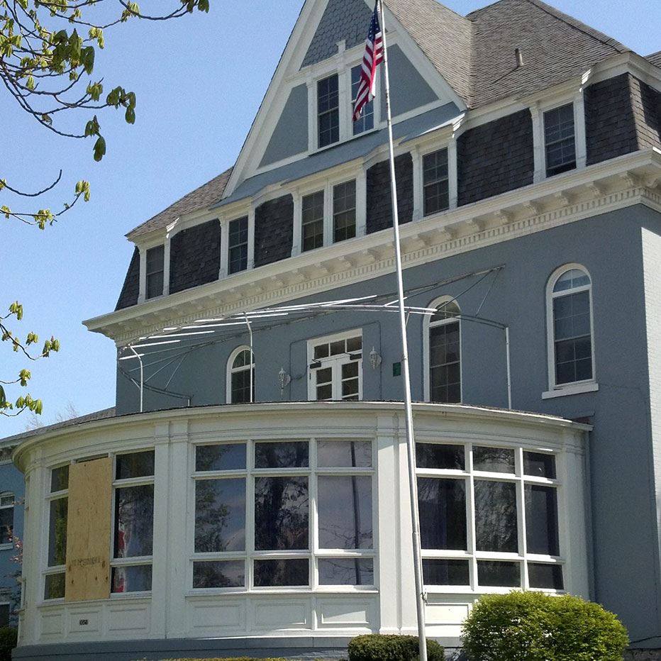 Paint of WNY exterior paint project with blue siding and white trim