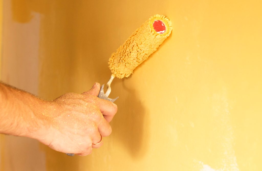 The process of coloring in yellow wall