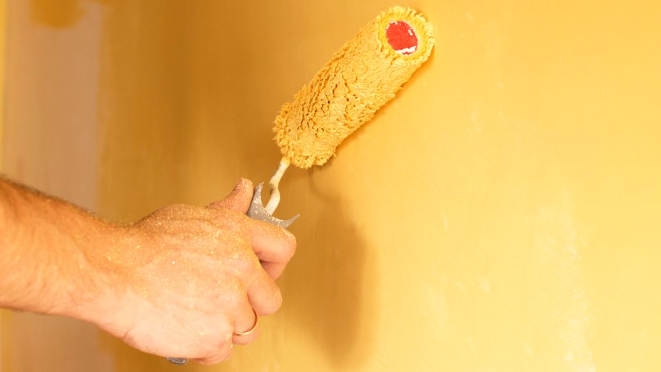 The process of coloring in yellow wall
